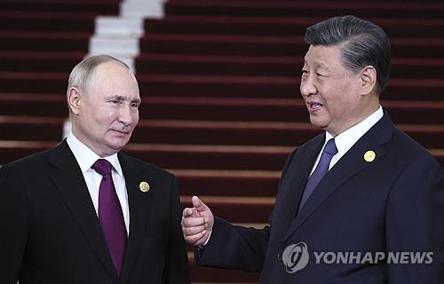 푸틴 러 대통령과 시진핑 중국 국가 주석 [AP 연합뉴스 자료사진]