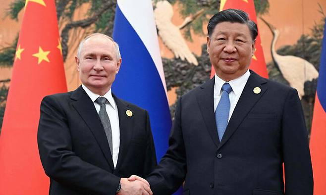 블라디미르 푸틴 러시아 대통령(왼쪽), 시진핑 중국 국가주석. AFP연합뉴스