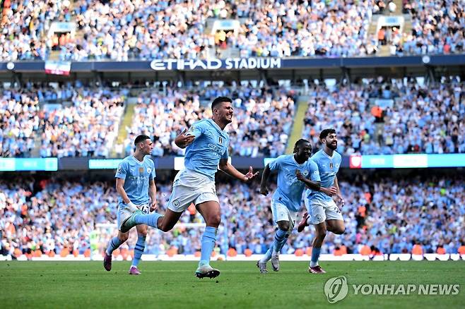 기뻐하는 맨시티 선수들 [AFP=연합뉴스]