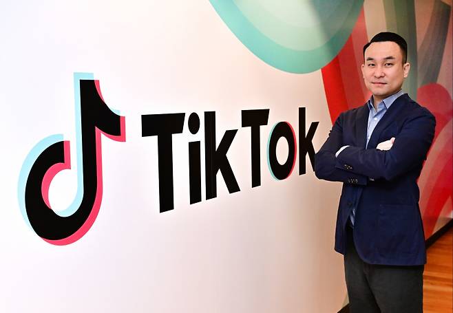 You Kyung-cheol, head of TikTok’s artist and label partnership, artist services in Northeast Asia, poses for a photo at the TikTok office in Gangnam-gu, Seoul, Thursday. (TikTok)