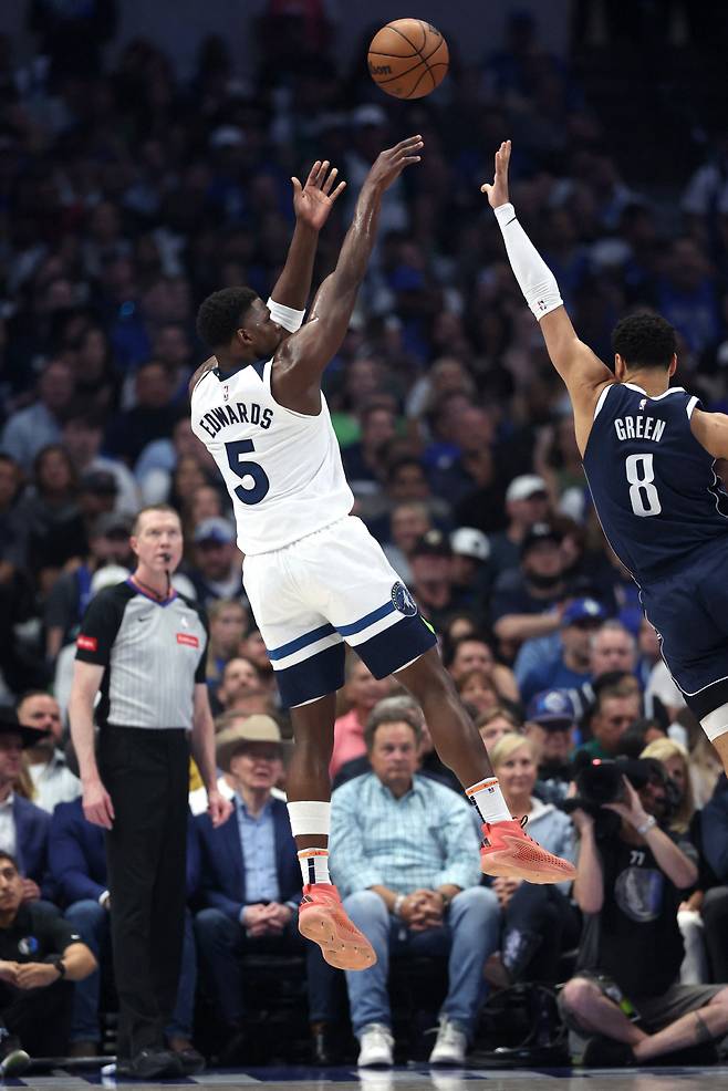 DALLAS, TEXAS - MAY 28: Anthony Edwards #5 of the Minnesota Timberwolves attempts a shot against the Dallas Mavericks during the first quarter in Game Four of the Western Conference Finals at American Airlines Center on May 28, 2024 in Dallas, Texas. NOTE TO USER: User expressly acknowledges and agrees that, by downloading and or using this photograph, User is consenting to the terms and conditions of the Getty Images License Agreement.   Matthew Stockman/Getty Images/AFP (Photo by MATTHEW STOCKMAN / GETTY IMAGES NORTH AMERICA / Getty Images via AFP)







<저작권자(c) 연합뉴스, 무단 전재-재배포, AI 학습 및 활용 금지>