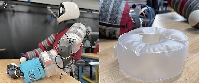 2 도요타연구소가 개발한 인간형 로봇 푸뇨의 소매 아래에는 공기가 들어있는 튜브와 압력 센서가 있다. 덕분에 푹신푹신한 팔로 물체을 안아 촉감을 감지할 수 있다. 사진 TRI