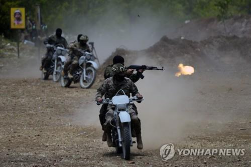 레바논 무장정파 헤즈볼라의 2023년 5월 공개 훈련 장면. [AFP 연합뉴스 자료사진. 재판매 및 DB 금지]