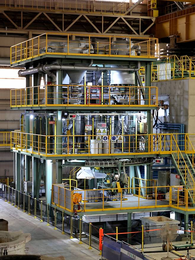 Posco’s advanced electric smelting furnace is separated for repairs at a pilot plant within the Pohang Works steel-making complex. (Posco)