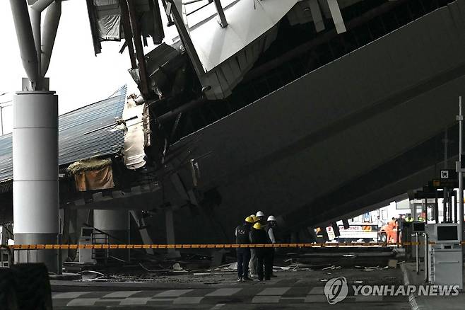 폭우에 붕괴된 뉴델리 공항 시설 [AFP 연합뉴스 자료사진. 재판매 및 DB 금지]