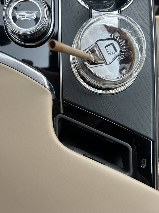 Lyriq offers a phone charging box. [SARAH CHEA]