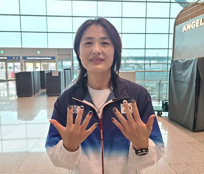 손가락을 펴 보이는 김미정 유도 여자대표팀 감독 [촬영 홍규빈]