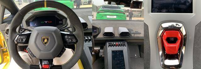 람보르기니 STO 내부 모습. 왼쪽부터 핸들, 중앙에 위치한 조작 버튼들, 빨간색 덮개가 씌워진 시동버튼 모습. 용인=강희경 기자