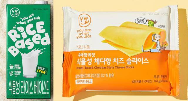 신세계푸드가 최근 출시한 식물성 제품 사진. 왼쪽은 가루쌀, 현미유 등 100% 식물성 원료로 만든 대안유(乳) '유아왓유잇 식물성 라이스 베이스드', 오른쪽은 귀리 등으로 만든 식물성 치즈 '유아왓유잇 식물성 체다향 치즈 슬라이스'. 신세계푸드 제공