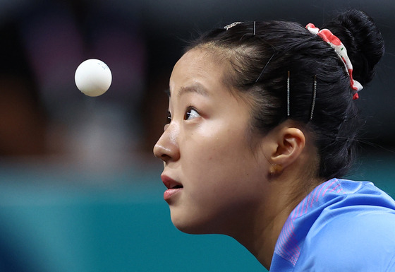 Shin Yu-bin of Korea in action during the bronze medal match against Hina Hayata of Japan at the Paris Arena in Paris on Saturday.  [REUTERS/YONHAP]