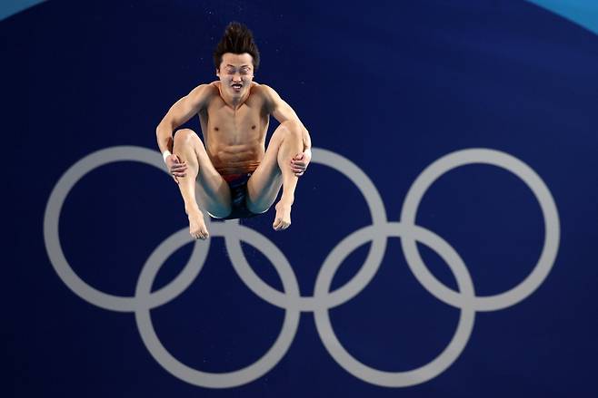 우하람이 6일(한국시간) 파리 아쿠아틱센터에서 열린 2024파리올림픽 다이빙 남자 3m 스프링보드 예선에서 혼신의 연기를 펼치고 있다. 파리 ｜뉴시스