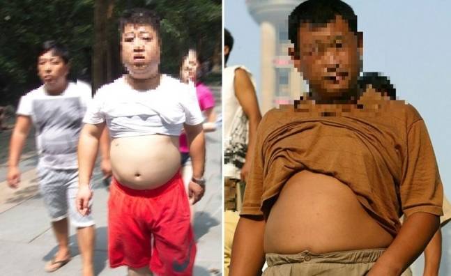 상의를 벗은 채 거리를 활보하는 중국 남성들. / 사진=게티이미지뱅크, CNN