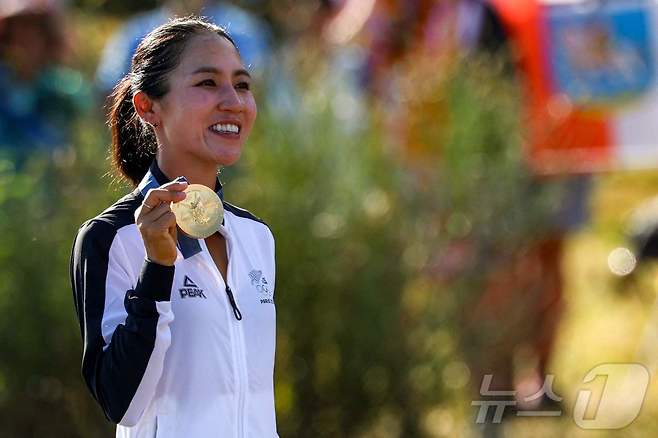 2024 파리 올림픽 금메달로 명예의 전당 입성 조건을 채운 리디아 고(뉴질랜드). ⓒ AFP=뉴스1