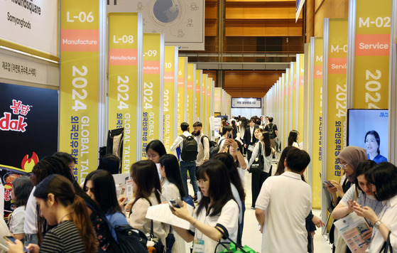 Visitors look around the Job Fair for International Students section of the 2024 Global Talent Fair [NEWS1]