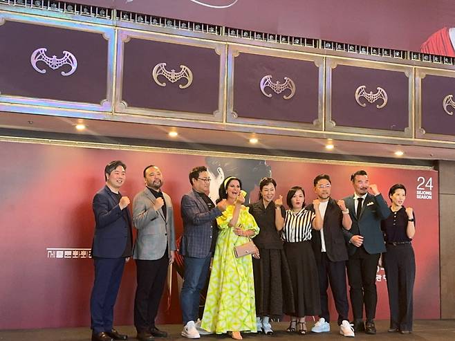 The cast and the creative team of "Tosca" pose for photos at a press conference at the Sejong Center for the Performing Arts on Friday. (Park Ga-young/The Korea Herald)