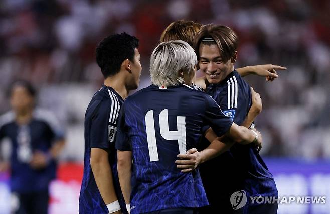 기뻐하는 일본 축구 대표팀 선수들 [로이터=연합뉴스]