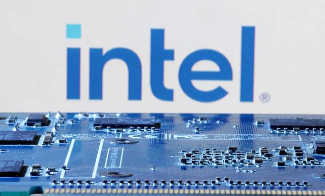 Intel logo is seen near computer motherboard in this illustration taken on Jan 8, 2024. (Reuters)