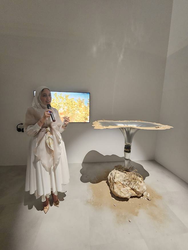 Nada Elkharashi speaks about her work, "Al-Fag’a Oasis: Harvesting Rainwater, Nurturing Nature," on Sept. 7 at the Qatar Pavilion in Gwangju. (Park Yuna/The Korea Herald)