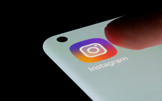 Instagram app is seen on a smartphone in this illustration taken, July 13, 2021. [REUTERS/YONHAP]