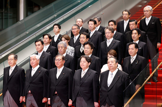 Japan's new Prime Minister Shigeru Ishiba, front center, poses with members of his cabinet at the prime minister's official residence in Tokyo on Tuesday. [AFP/YONHAP]