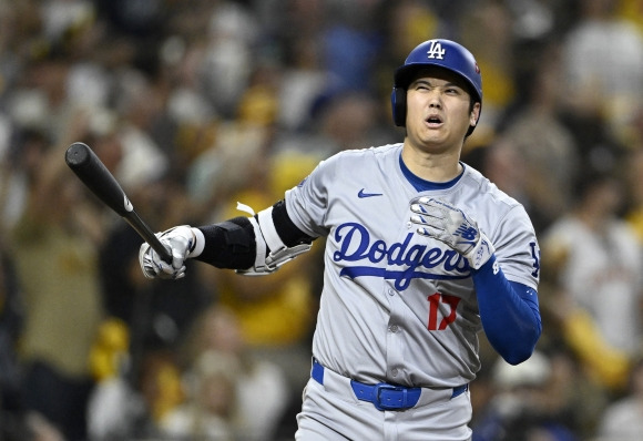 BASEBALL-MLB-SD-LAD/ - Oct 8, 2024; San Diego, California, USA; Los Angeles Dodgers designated hitter Shohei Ohtani (17) reacts to a strike in the eighth inning against the San Diego Padres during game three of the NLDS for the 2024 MLB Playoffs at Petco Park.  Mandatory Credit: Denis Poroy-Imagn Images    <Copyright (c) Yonhap News Agency prohibits its content from being redistributed or reprinted without consent, and forbids the content from being learned and used by artificial intelligence systems.>