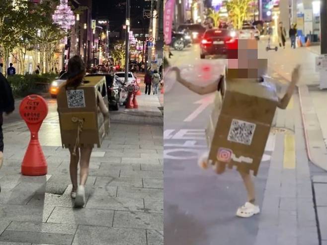 사진=번화가에서 박스만 걸친 채 길거리를 활보하던 모습이 포착됐다. 온라인 커뮤니티