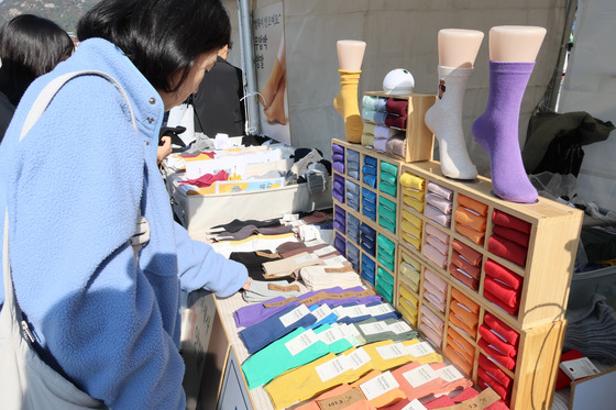 Visitors wander around the 2024 Small Business Day event in Gwanghwamun Square in central Seoul on Tuesday. [YONHAP]