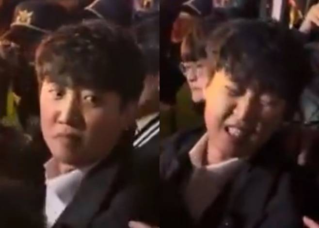 이준석 개혁신당 의원이 지난 3일 비상계엄 선포 이후 국회 출입을 통제당하자 월담을 제안하는 한 남성에게 “시끄러워 인마”라고 답하는 영상이 온라인상에 퍼지고 있다. [엑스]