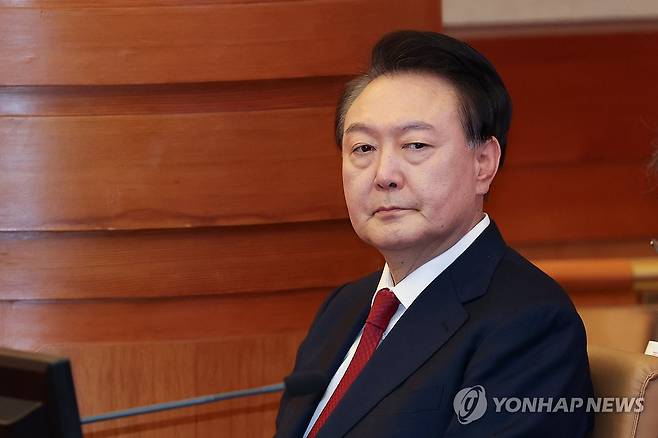 계엄사태 이후 첫 공개석상 나선 윤석열 대통령 (서울=연합뉴스) 임화영 기자 = 윤석열 대통령이 21일 오후 서울 종로구 헌법재판소에서 열린 탄핵심판 3차 변론에 출석해 피청구인 좌석에 앉아있다. 2025.1.21
hwayoung7@yna.co.k