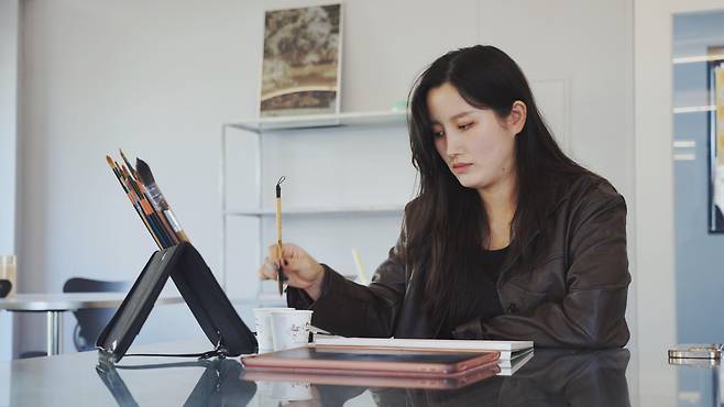 타투이스트 나르는 수채화 타투 디자인을 주력으로 하고 있다