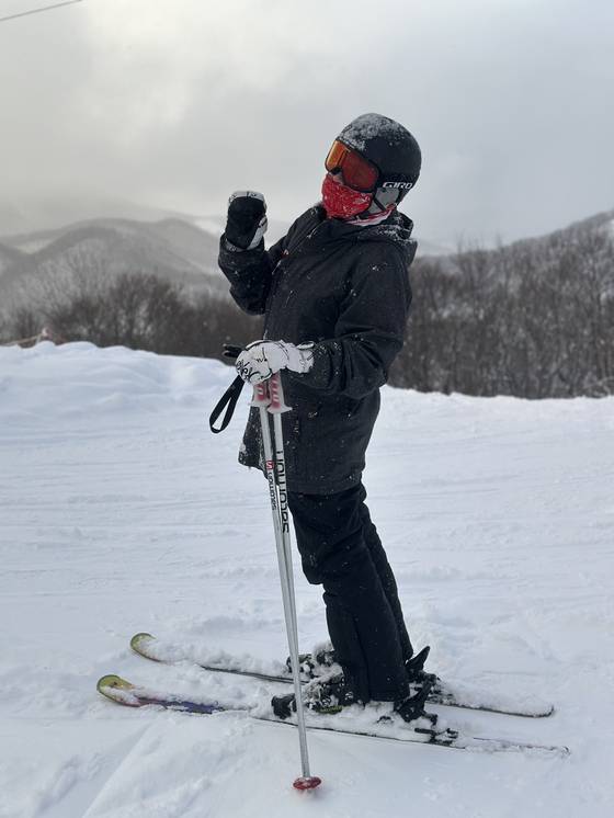 Monica waves to the camera before taking off down the slope. [RAMONA PARK]
