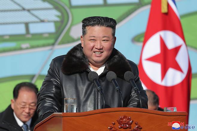 North Korean leader Kim Jong-un speaks during a groundbreaking ceremony in Sinuiju, North Pyongan Province, on Feb. 10 for a 450-hectare greenhouse farm and vegetable science research base, in this photo released by North Korea's official Korean Central News Agency the next day. (Yonhap)