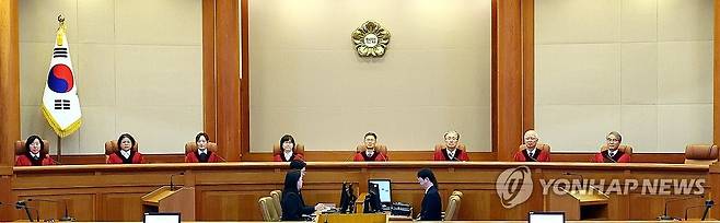 검사 및 감사원장 탄핵심판 선고 (서울=연합뉴스) 서대연 기자 = 이창수 중앙지검장 등 검사 3인 및 최재해 감사원장에 대한 탄핵심판 선고가 열린 13일 서울 종로구 헌법재판소에서 문형배 헌법재판소장 권한대행을 비롯한 헌법재판관들이 자리하고 있다. 2025.3.13 [공동취재] dwise@yna.co.kr