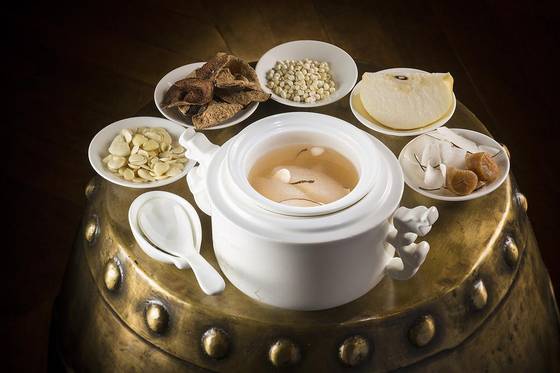 Double-boiled pear soup with Chinese tonic herbs and sea coconut, served at the three-star Michelin restaurant Jade Dragon in Macau [MELCO RESORTS AND ENTERTAINMENT]