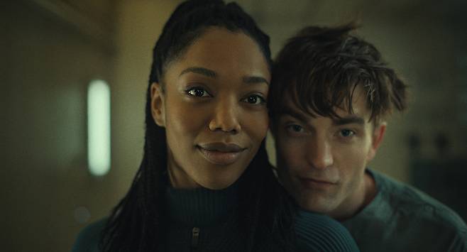 Naomi Ackie (left) and Robert Pattinson star in "Mickey 17." (Warner Bros. Pictures)