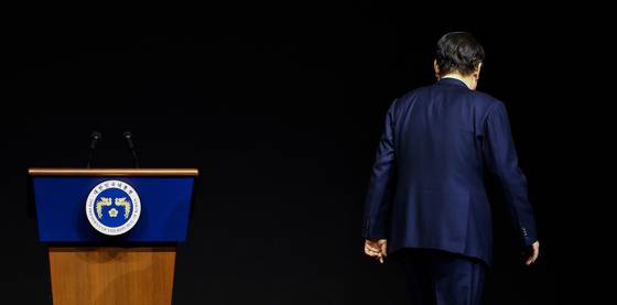 Former President Yoon Suk Yeol walks away from the podium at an event in March 2023. Yoon's impeachment was upheld by the Constitutional Court on April 4, 2025, removing him from office. [YONHAP]