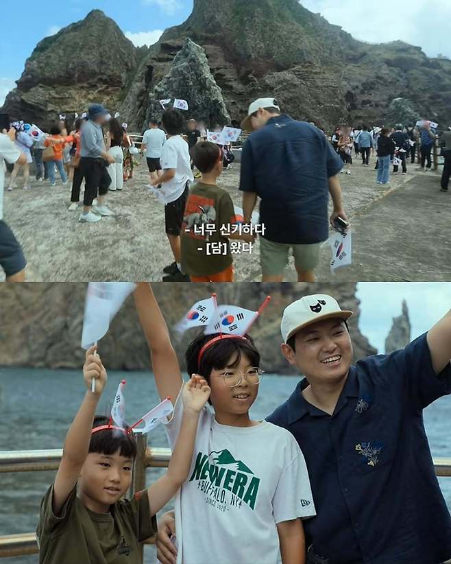 넷플릭스 예능 ‘대환장 기안장’의 한 장면. 한 가족이 태극기를 들고 독도 관광을 하고 있다. 대환장 기안장 화면 캡처