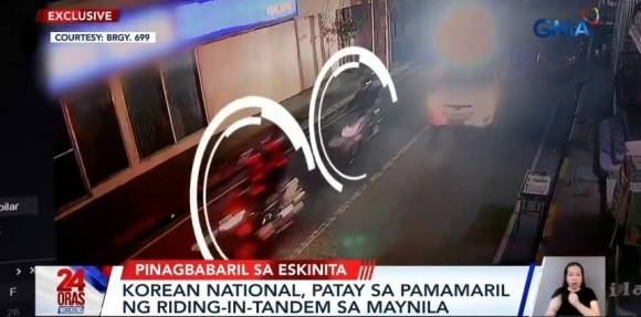 지난달 필리핀 마닐라 말라테구 길거리에서 한국인 A씨에 총격을 가한 강도 4명이 오토바이 2대(흰색 원 안)에 나눠 타고 달아나는 모습. 기사와 직접적인 관련 없음. GMA뉴스 유튜브 캡처
