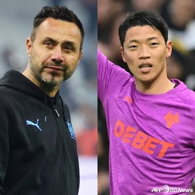 로베르트 데 제르비(왼쪽) 감독과 황희찬. /AFPBBNews=뉴스1