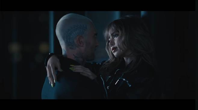 Adam Levine, left, and Lisa in the music video for ″Priceless," released on May 2 [INTERSCOPE RECORDS/SCREEN CAPTURE]