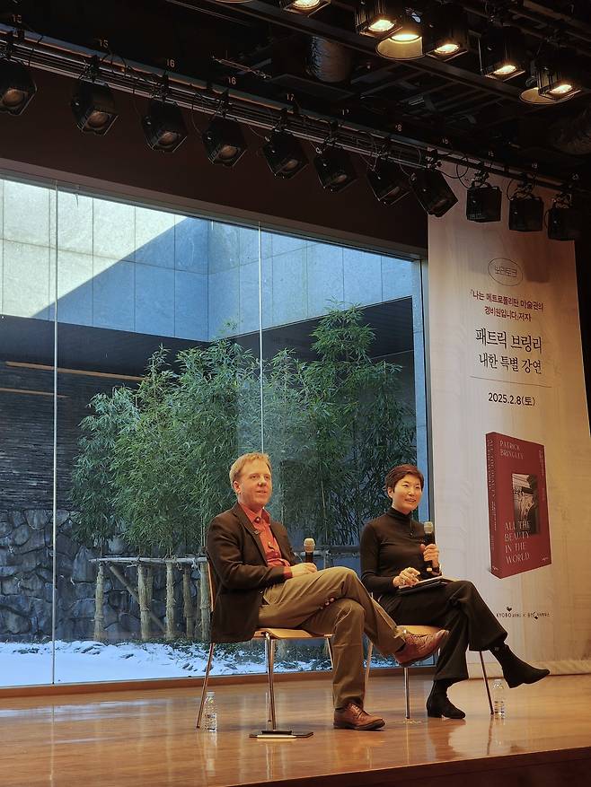 Patrick Bringley (left) speaks during a talk at Kyobo Book Center in central Seoul on Saturday. (Hwang Dong-hee/The Korea Herald)