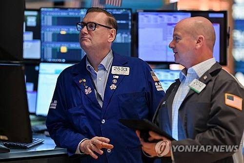 뉴욕증권거래소의 트레이더 [AFP 연합뉴스 자료사진. 재판매 및 DB 금지]