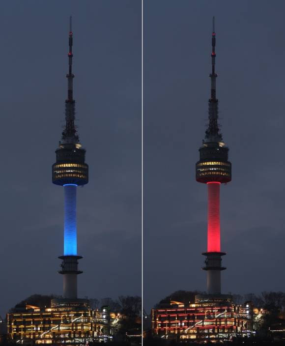 지난 2월 15일 서울 남산서울타워에 한국과 일본의 국기를 상징하는 파란색과 빨간색이 번갈아 비춰지고 있다. 서울과 도쿄의 상징적 랜드마크인 남산서울타워와 도쿄타워는 이날 한일 국교정상화 60주년을 기념해 동시에 불을 밝혔다.  연합뉴스