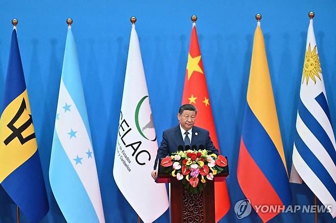 CHINA-CELAC-DIPLOMACY 시진핑 중국 국가주석이 지난 13일 중국-CELAC 제4차 장관급회의 개막식에서 연설하는 모습. [AFP= 연합뉴스 자료사진. 재판매 및 DB금지]