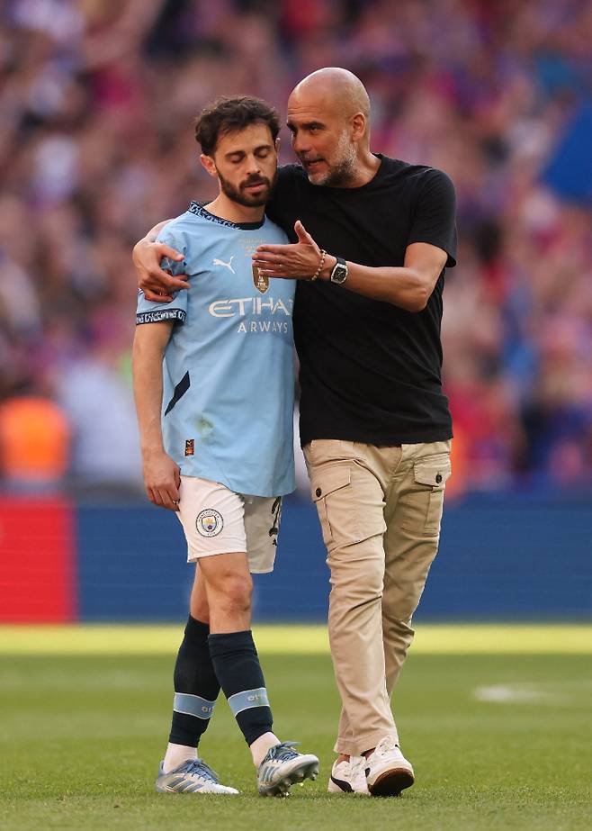 페프 과르디올라 감독과 베르나르두 실바. 연합뉴스