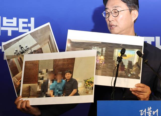 더불어민주당 노종면 선대위 대변인이 19일 서울 여의도 당사에서 "윤석열 전 대통령의 내란 혐의 사건 재판장인 지귀연 서울중앙지법 부장판사가 유흥업소에서 접대받았다"라는 의혹을 제기하며 관련 사진을 공개하고 있다. 연합뉴스