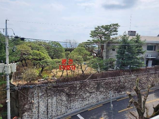 강제경매가 진행 중인 정대선 전 HN Inc 사장 소유의 서울 성북동 대지. /지지옥션 제공