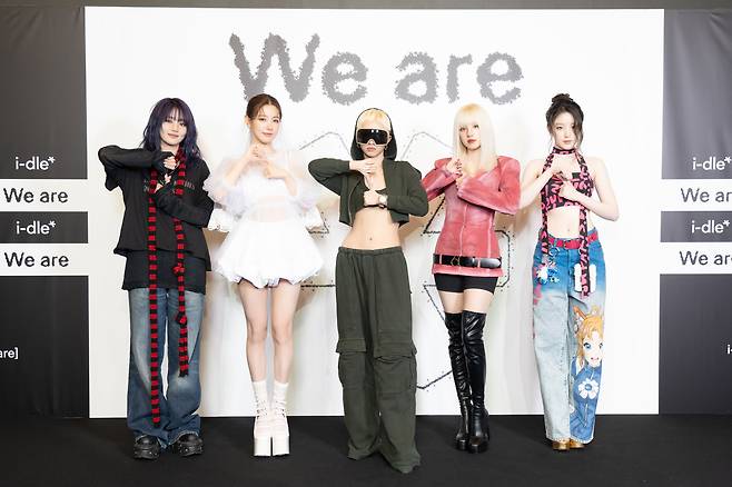 From left: I-dle's Minnie, Miyeon, Soyeon, Yuqi and Shuhua pose for a photo at a press conference in Gangnam, Seoul, Monday. (Cube Entertainment)