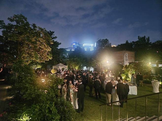 Attendees gather at the British Embassy Residence Garden to celebrate King Charles III's birthday on Thursday in Jung-gu, Seoul (Park Yuna/The Korea Herald)