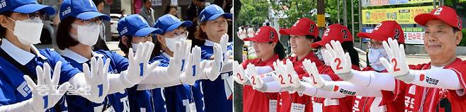 제21대 대통령선거 공식 선거운동 첫 주말을 맞은 18일 더불어민주당과 국민의힘 선거운동원들이 시민들에게 지지를 호소하고 있다. 이성희 기자 token77@